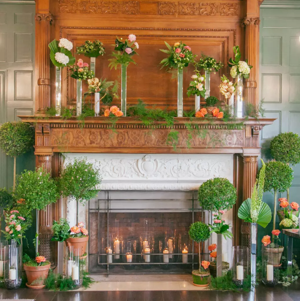 wedding venue fireplace and floral
