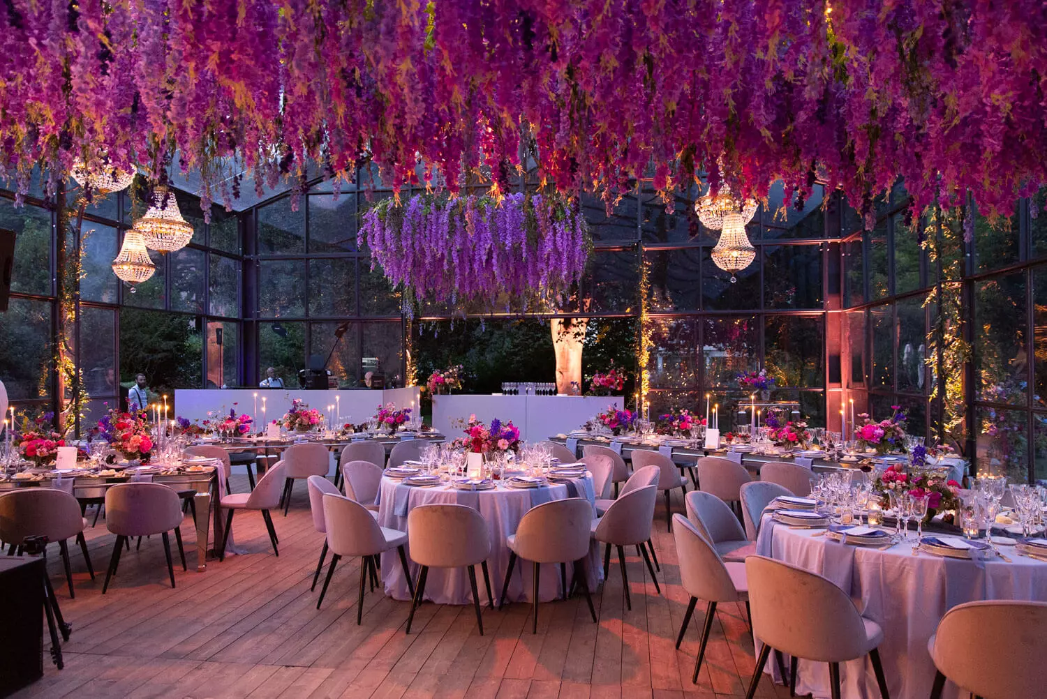 Beautiful wedding event produced by Leslie Mastin Events. Wedding venue decorated with purple floral